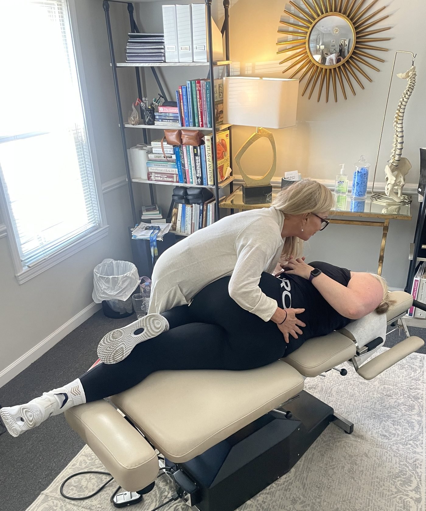 Chiropractic adjustment on the treatment table