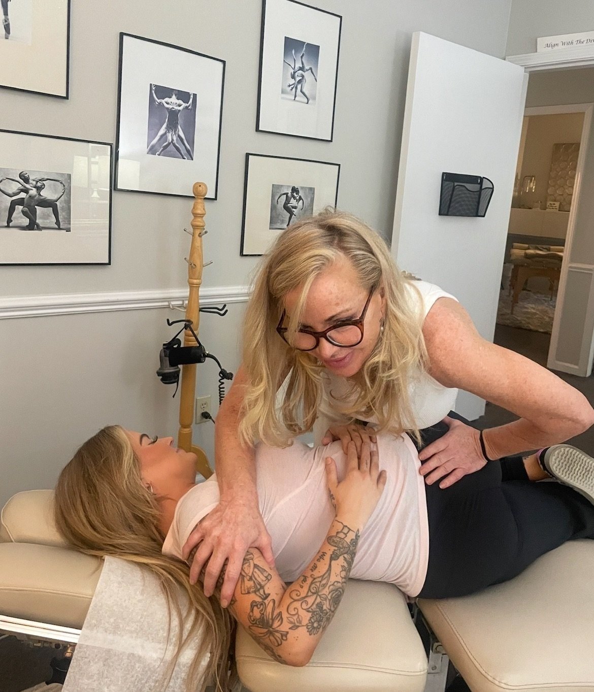 Dr. Christensen adjusting a patient on the examination table